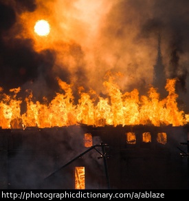 Photo of a house ablaze