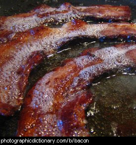 Photo of bacon being fried
