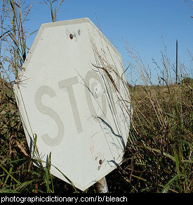 Photo of a bleached stop sign