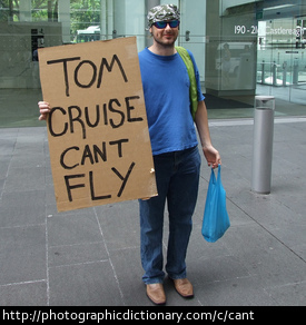 Photo of a sign that says Tom Cruise Can't Fly