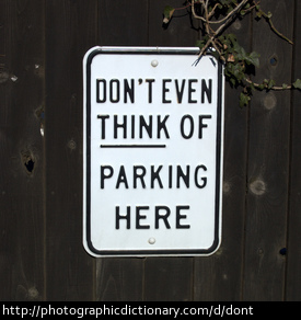 Photo of a don't park here sign