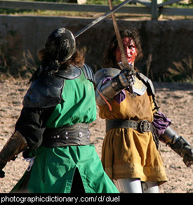 Photo of two people having a duel