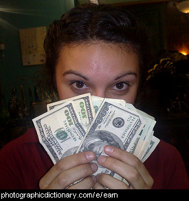 Photo of a woman with money