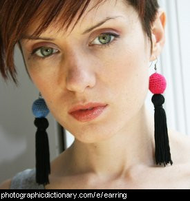 Photo of a woman wearing earrings