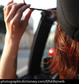 Photo of a woman fiddling with her hair