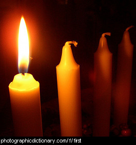 Photo of a lit candle