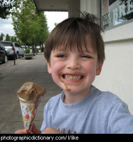 Photo of a boy eating icecream