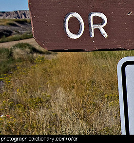 Photo of a sign that says or