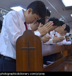 Photo of young men praying