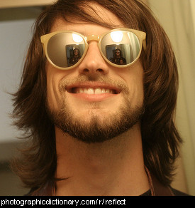 Photo of a man with reflective sunglasses