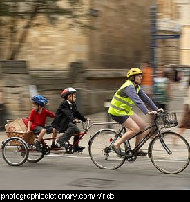 Photo of a family riding a bike
