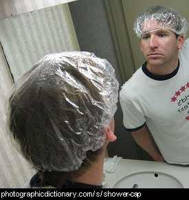 Photo of someone wearing a shower cap