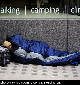 Photo of a man in a sleeping bag