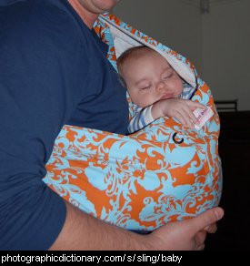 Photo of a baby in a sling