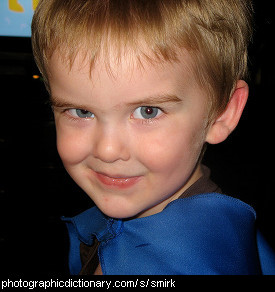 Photo of a boy smirking