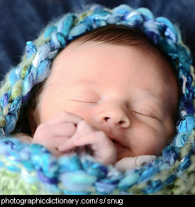 Photo of a snug baby