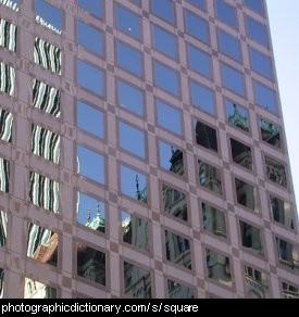 Photo of a skyscraper with square windows