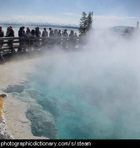 Photo of steam rising from a hot pool.
