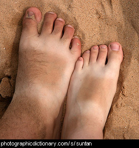 Photo of feet with tan lines