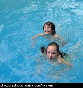 Photo of some children swimming