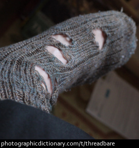 Photo of a threadbare sock