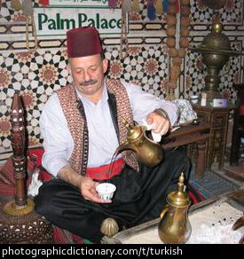 Photo of a man in a Turkish coffee house