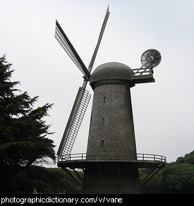 Photo of a windmill with vanes