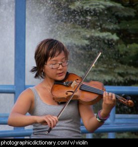 Photo of a woman playing a violin