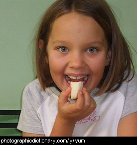 Photo of a child eating yummy food