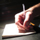 Photo of a hand writing