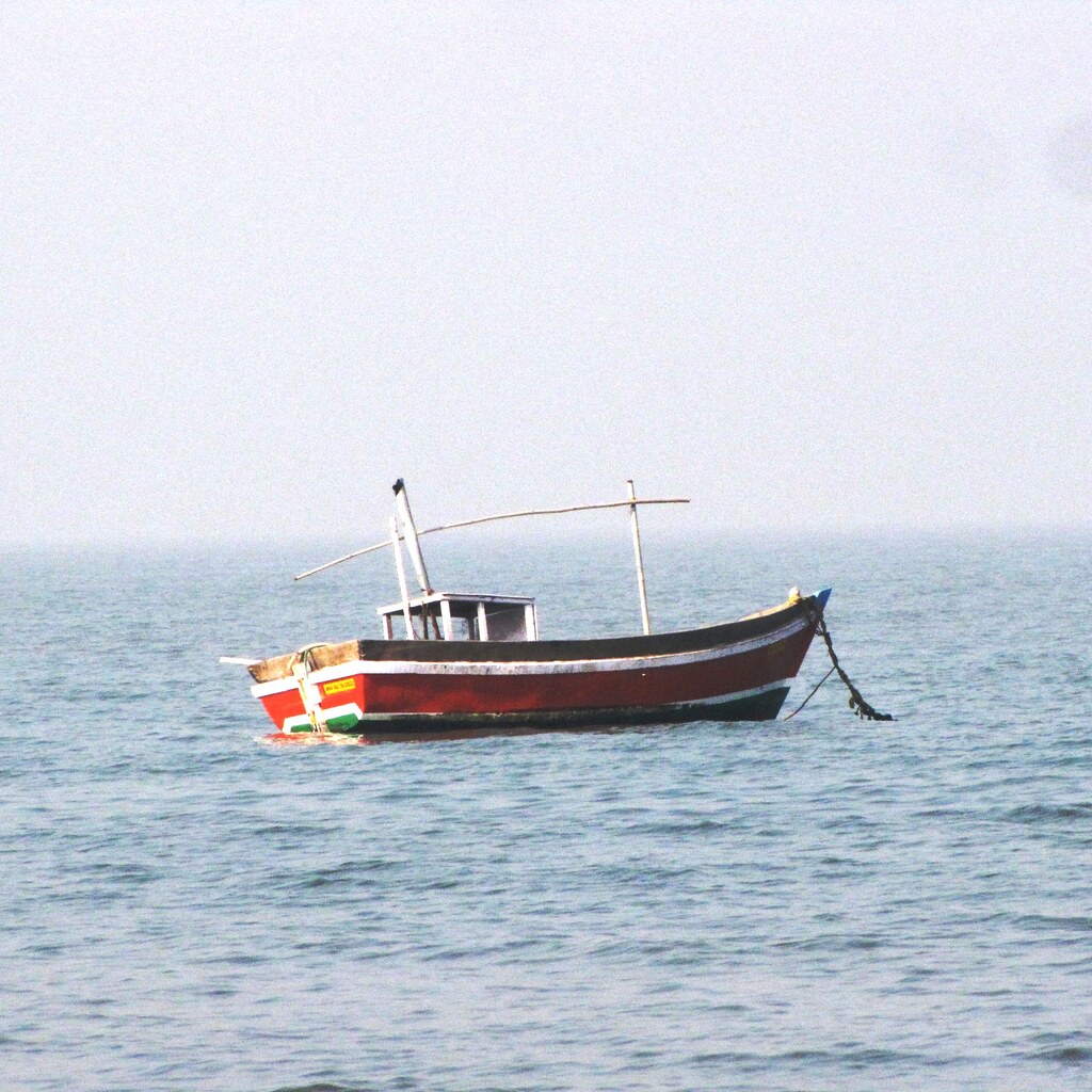 A boat adrift at sea.