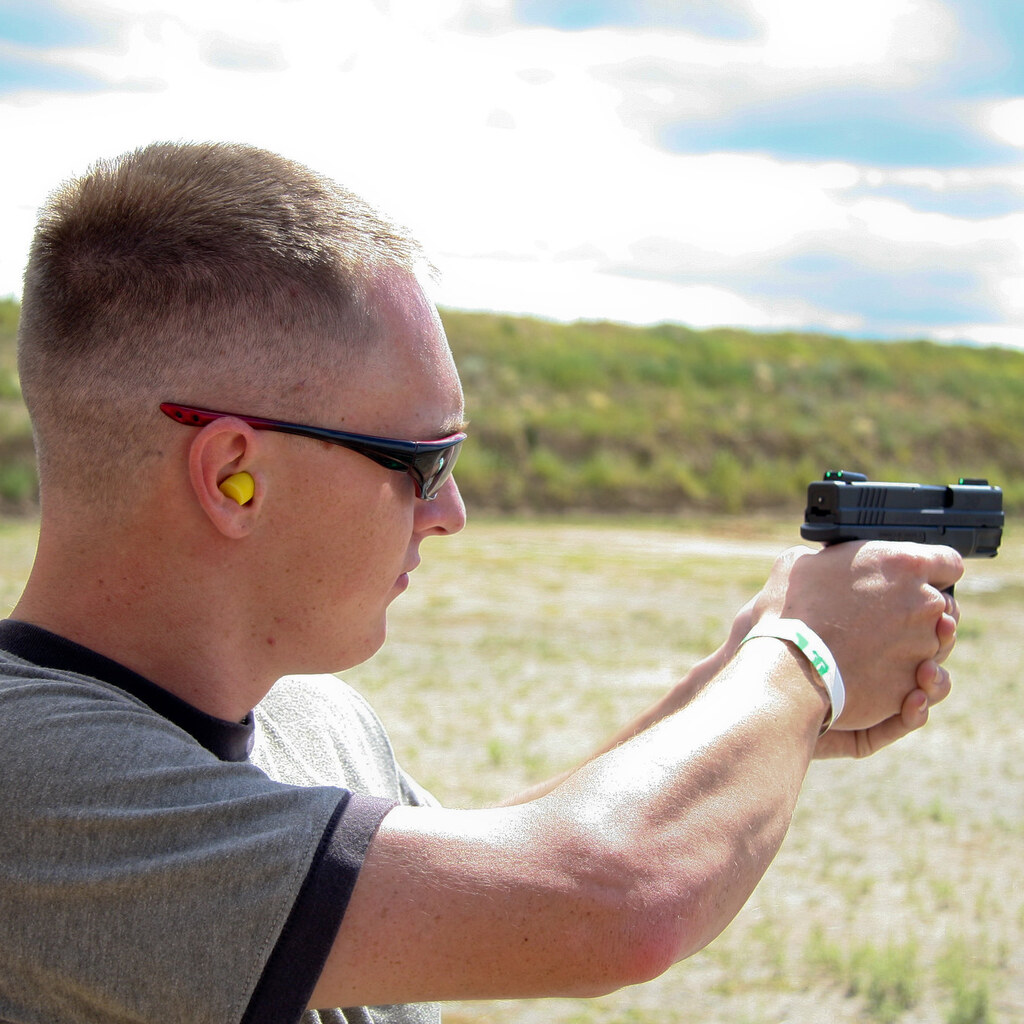Photo of someone aiming a gun
