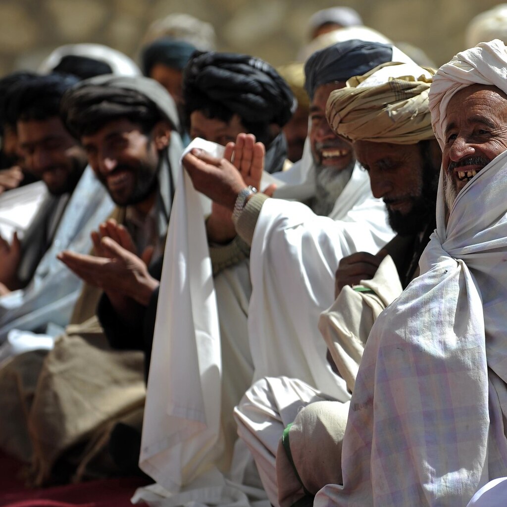 Photo of men applauding