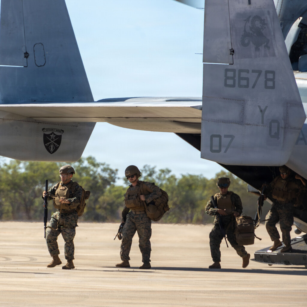 Photo of men arriving on a plane
