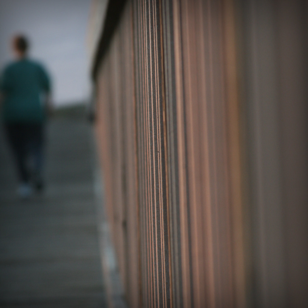 Photo of a man walking away