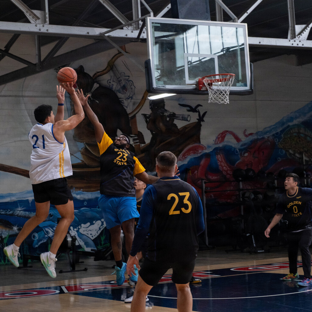 Photo of people playing basketball
