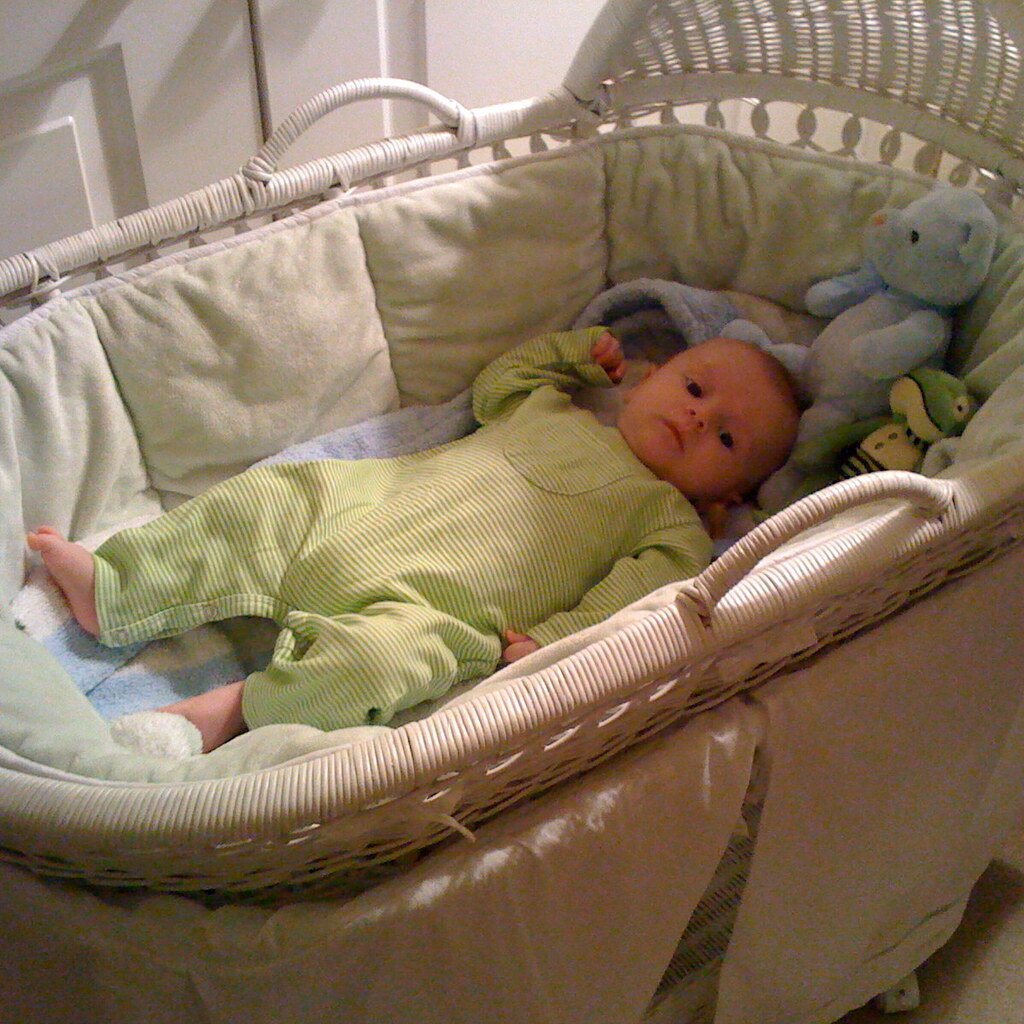 Photo of a baby in a bassinet