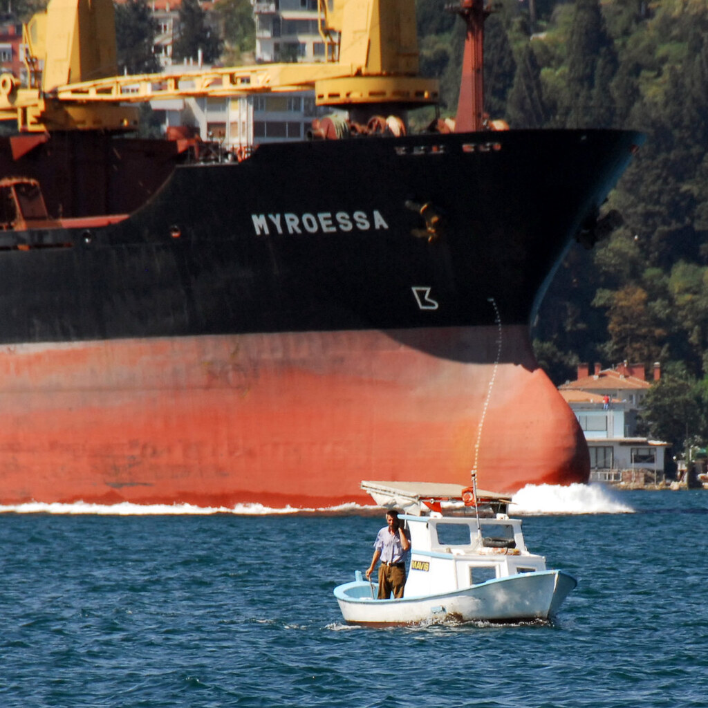 Photo of a big boat and a small boat