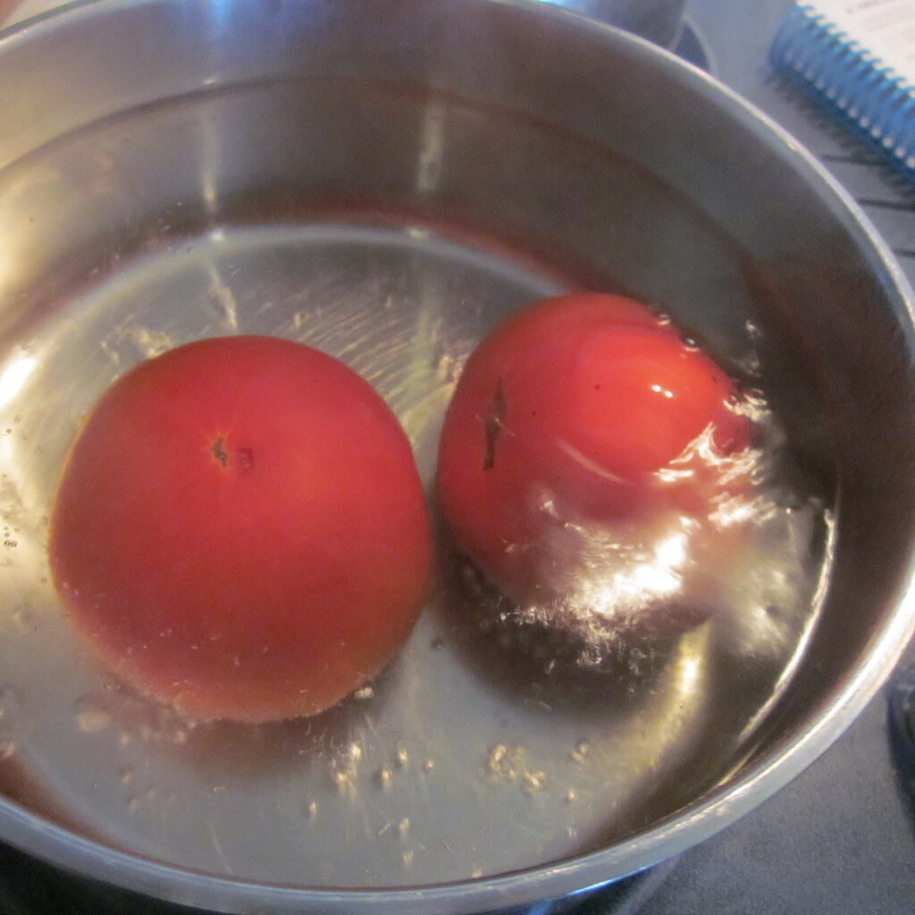 Photo of blanching tomatoes