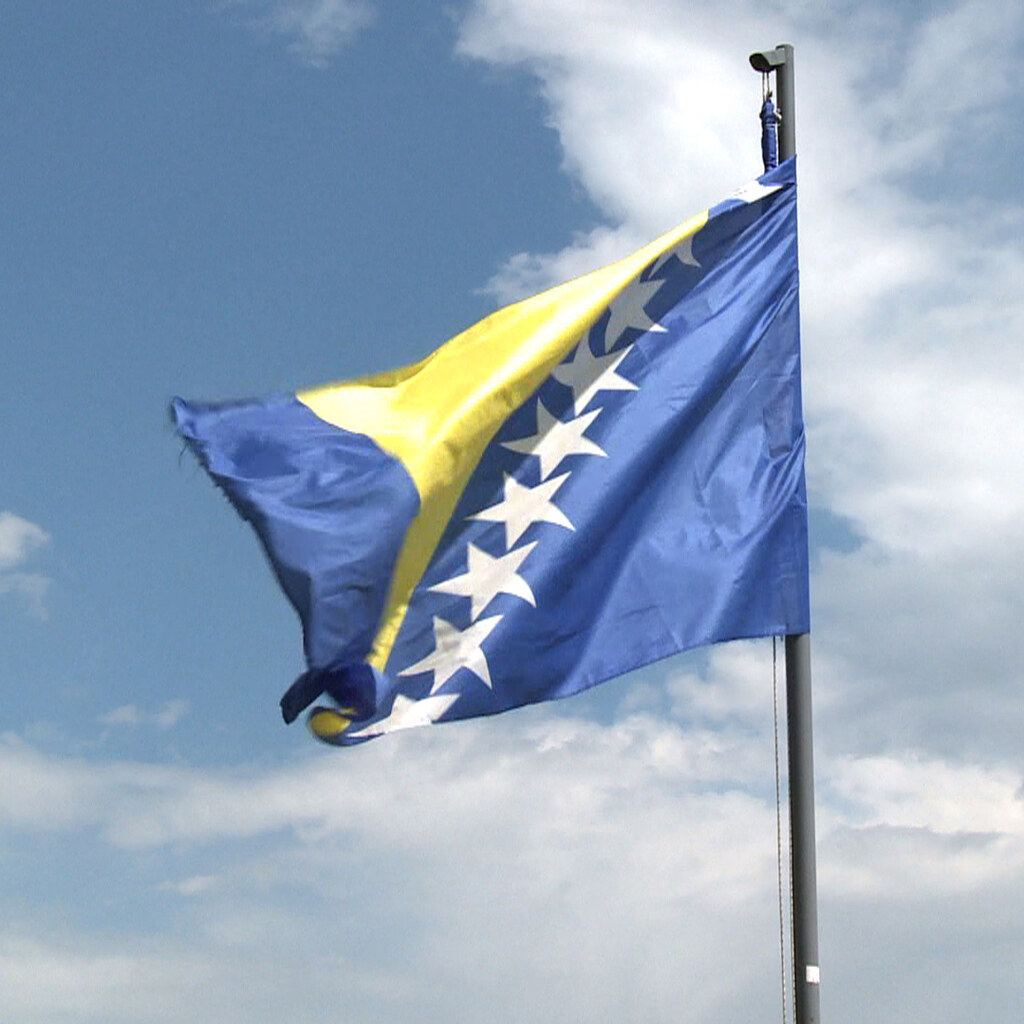 The flag of Bosnia and Herzegovina.
