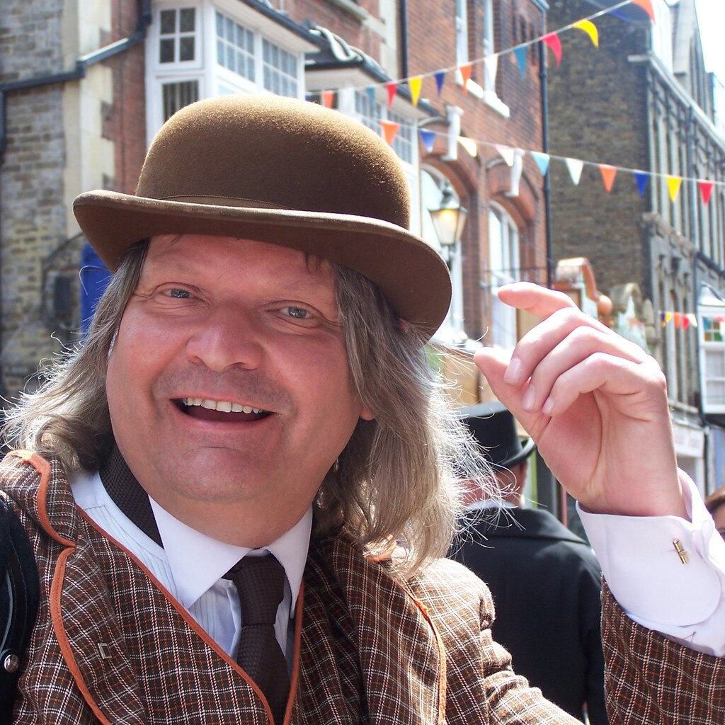 Photo of a man wearing a bowler hat