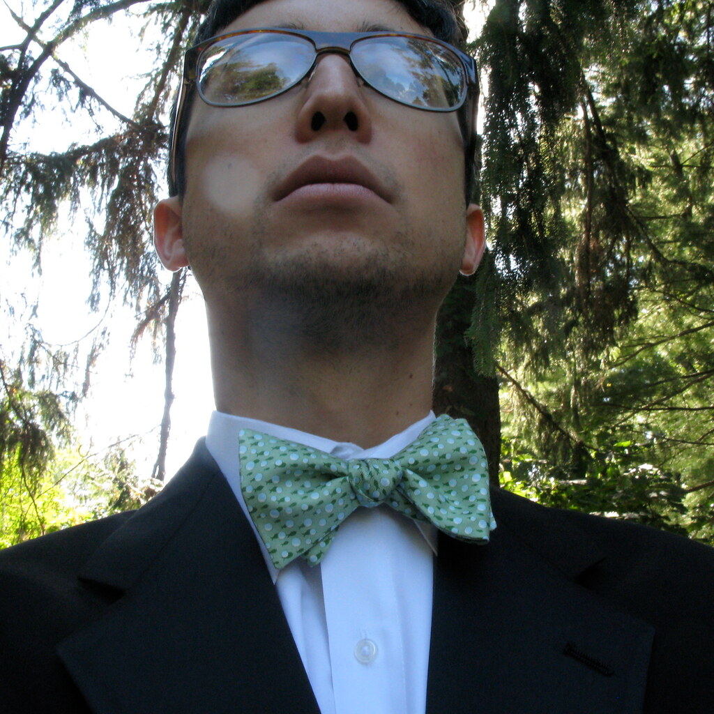Photo of a man wearing a bow tie.