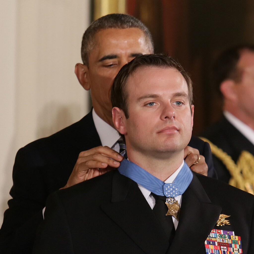 Photo of a man being awarded for bravery