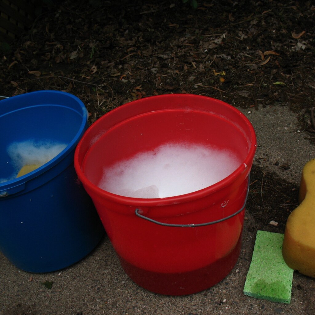Photo of a red bucket.