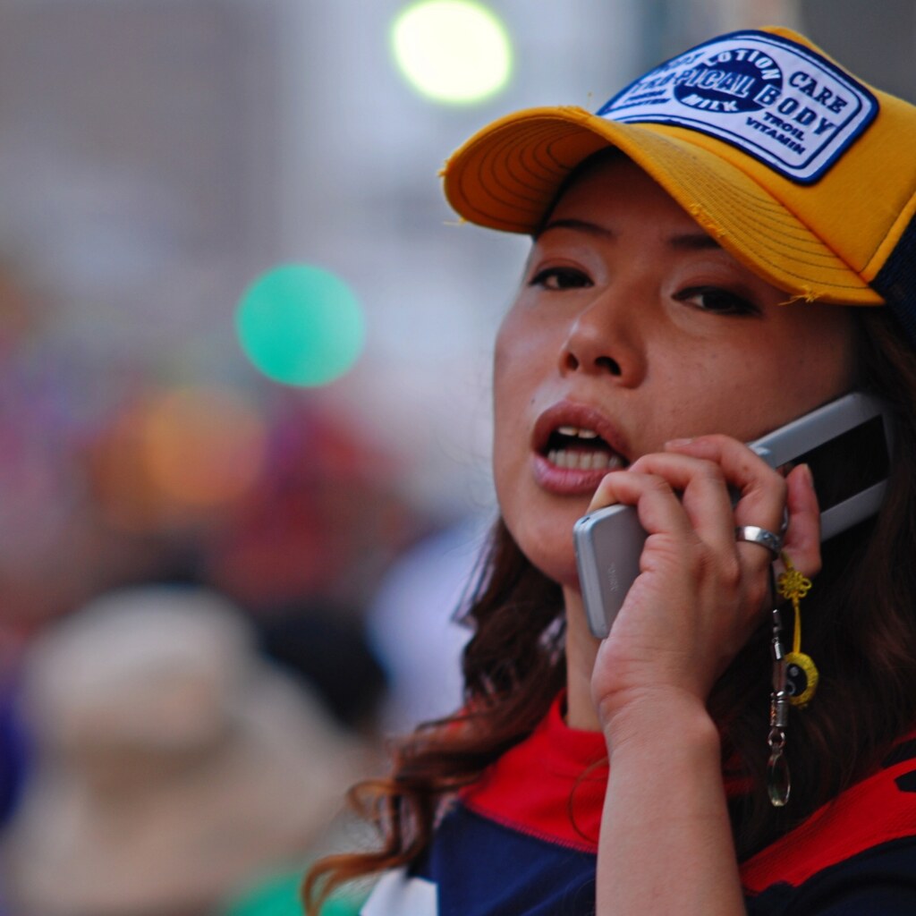 Photo of a woman taking a phone call
