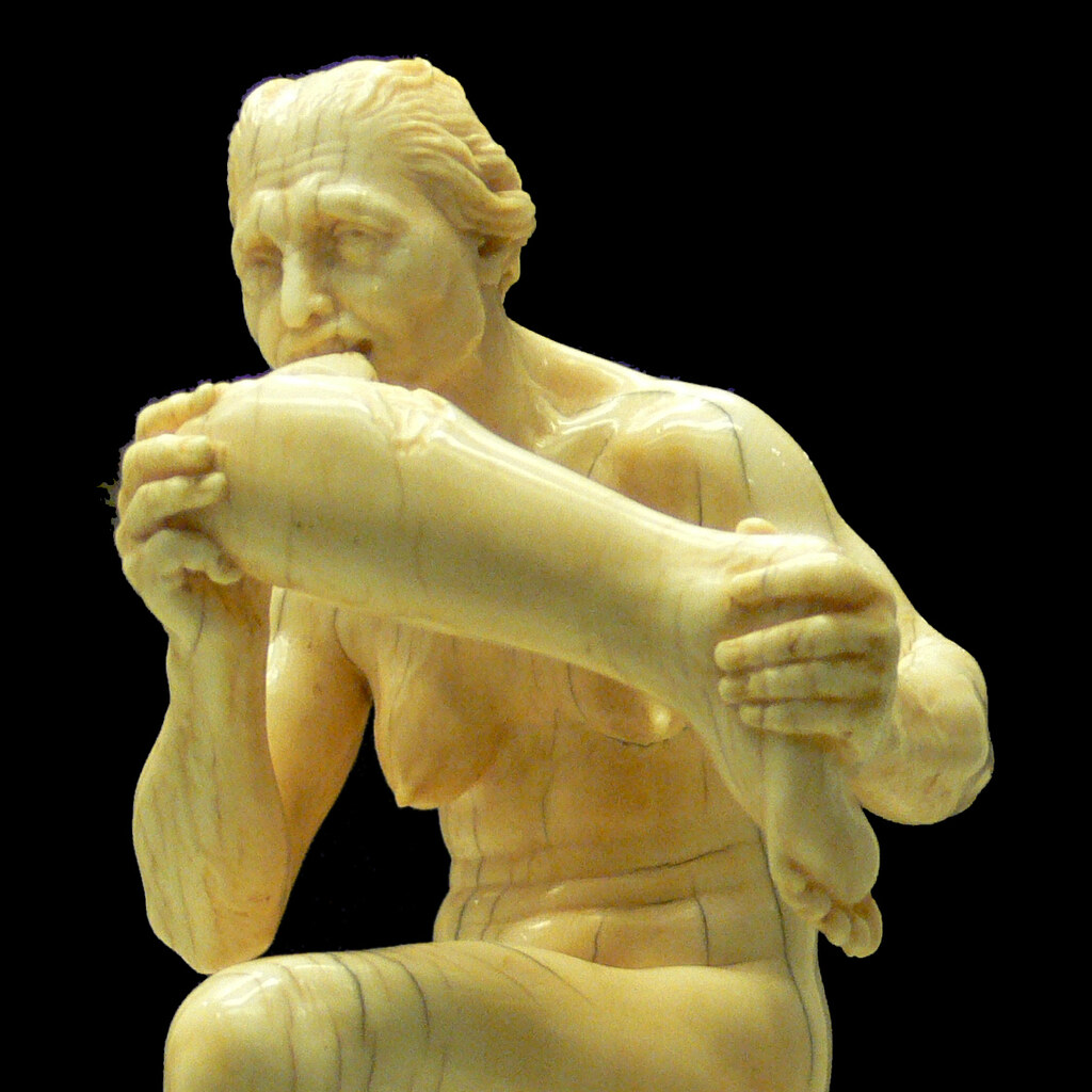 Photo of a statue of a cannibal.
