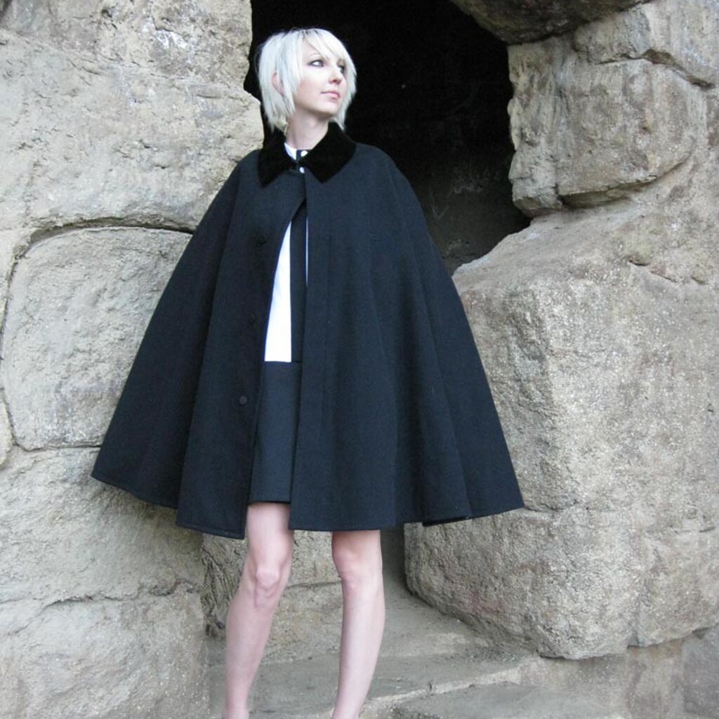 Photo of a woman wearing a cape