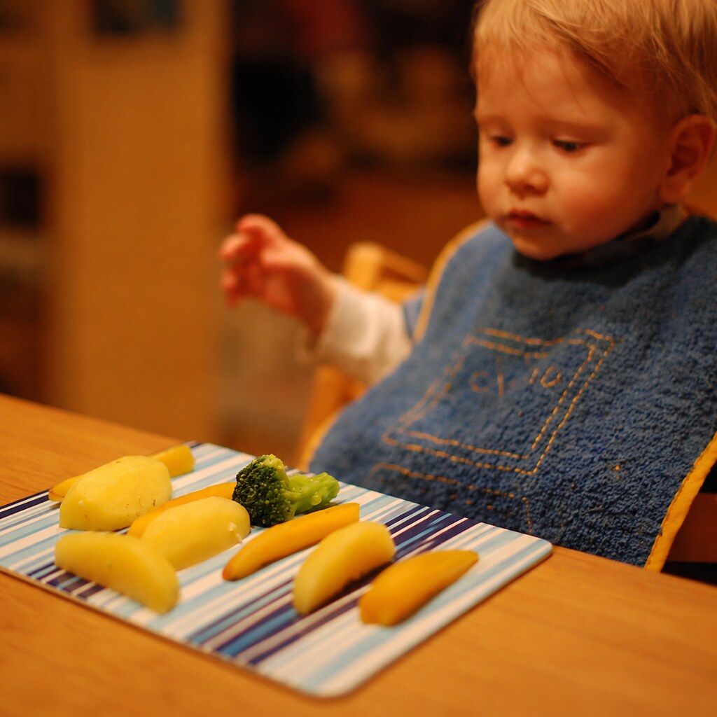 Photo of a toddler choosing