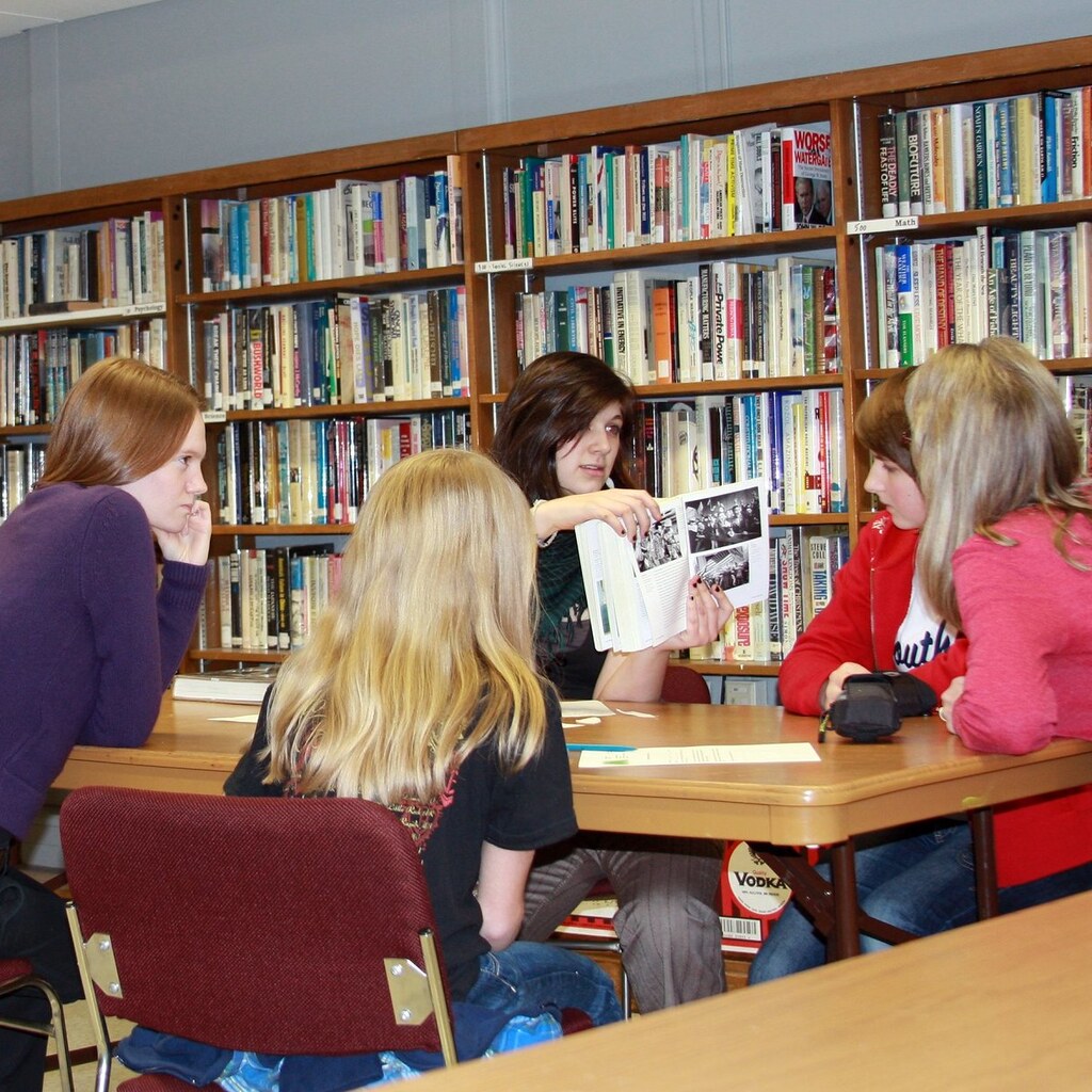 Photo of a group of teens in a library