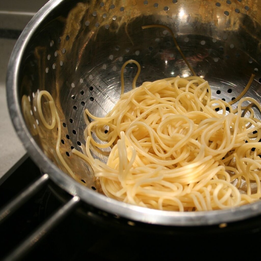 Photo of a colander with spaghetti in it